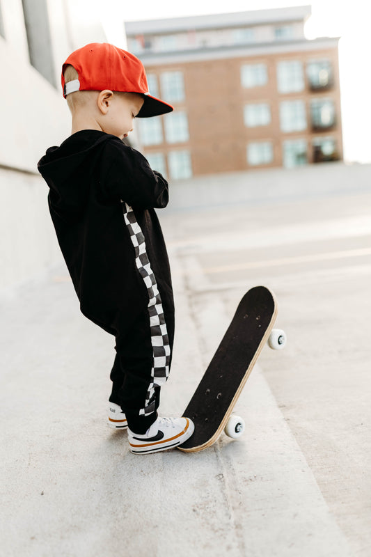 SIDE CHECK • ZIP-UP HOODED ROMPER