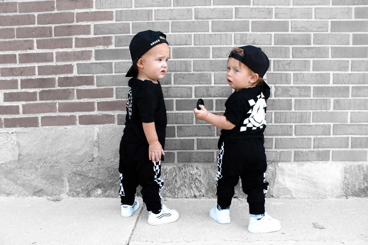 IMPERFECT SIDE CHECK • BLACK JOGGERS