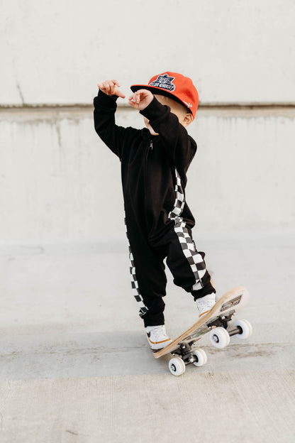 SIDE CHECK • ZIP-UP HOODED ROMPER
