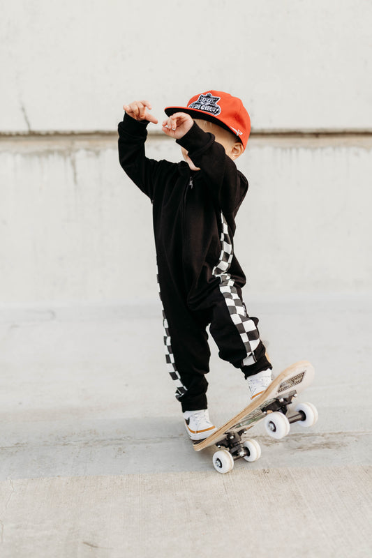 SIDE CHECK • ZIP-UP HOODED ROMPER